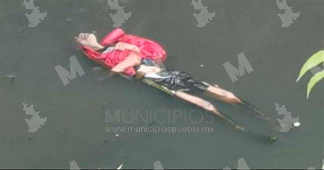 Encuentran flotando cadáver de joven en canal de Valsequillo en Puebla
