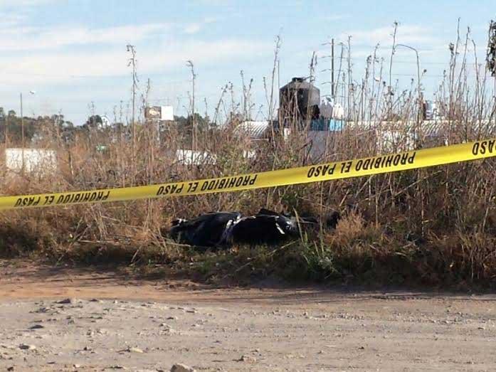 Dejan cadáver embolsado en libramiento a San Juan Tuxco, Texmelucan