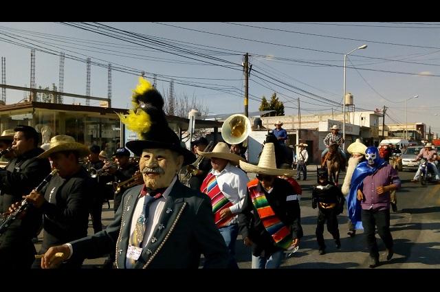 Con mascaritas inician actividades de carnaval de Huejotzingo