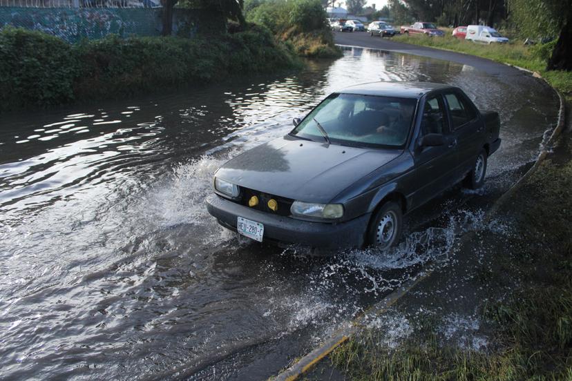 Inundaciones y encharcamientos deja intensa lluvia en Puebla