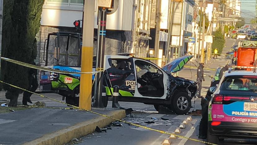 Muere taxista en choque contra patrulla en Puebla capital