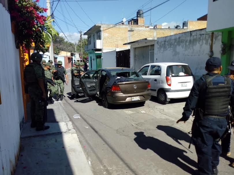 Se arma balacera tras robo en Atlixco 