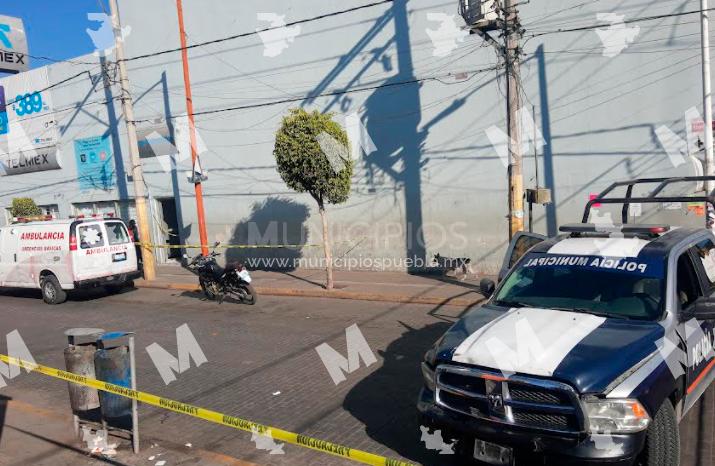 Hallan cadáver dentro de cajero de Telmex en Texmelucan