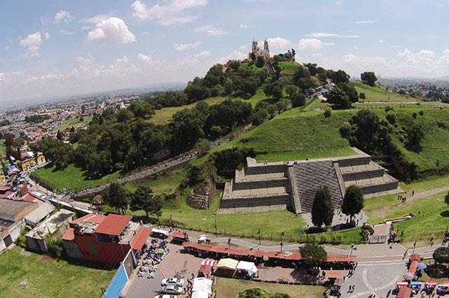 Temen daños en zona arqueológica de Cholula por autocinema