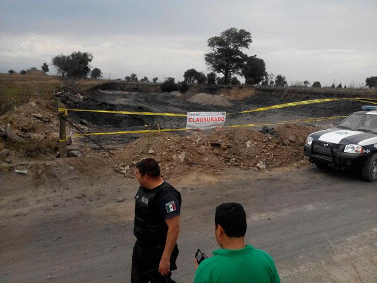 Clausuran tiradero de plomo y cadmio en Coronango