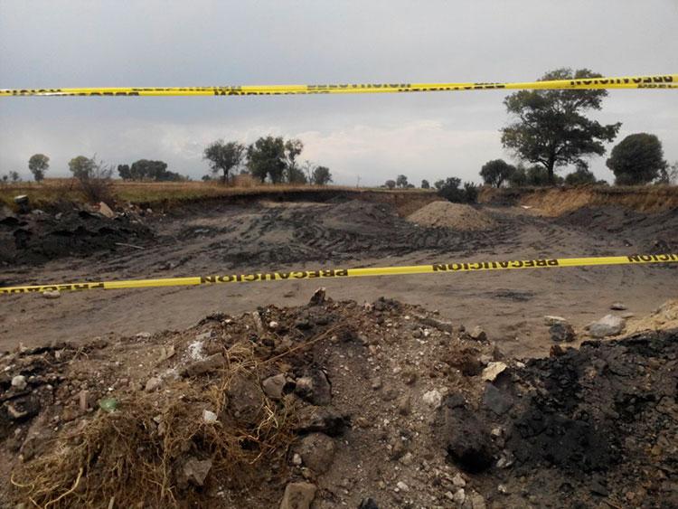 Clausuran tiradero de plomo y cadmio en Coronango