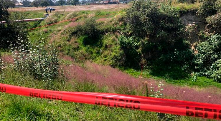 Arrojan cadáver de mujer al fondo de una barranca en Tochtepec
