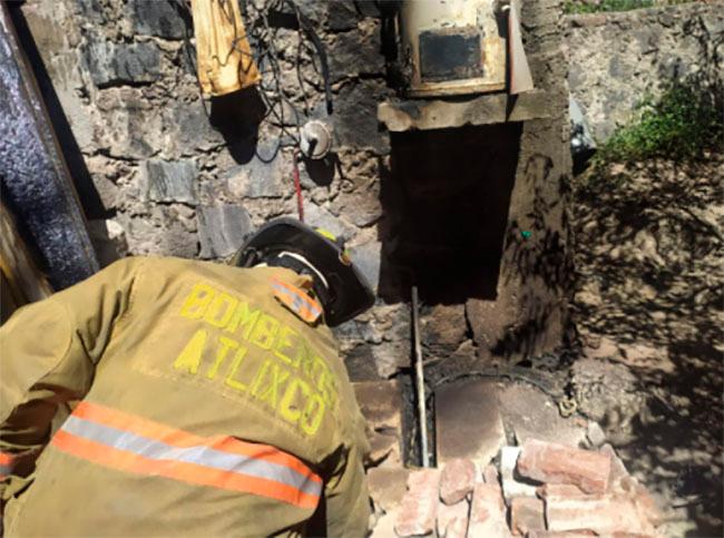 Se llevan susto en casa de Atlixco por incendio de tanque de gas