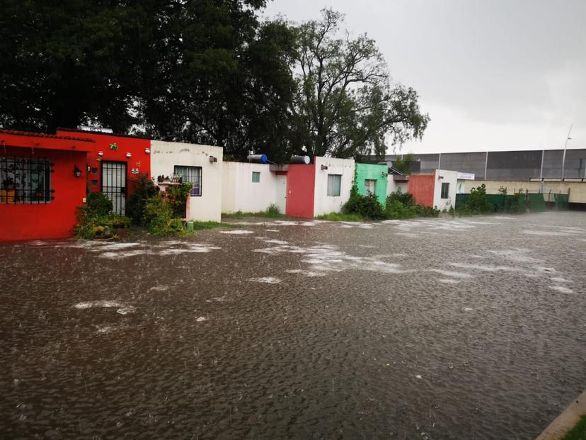 Lluvia inunda fraccionamiento en Huejotzingo