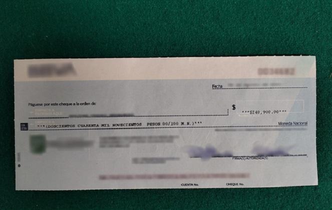 Intercepta GN cheque enviado de Puebla a EU por 2.6 mdp sin declarar