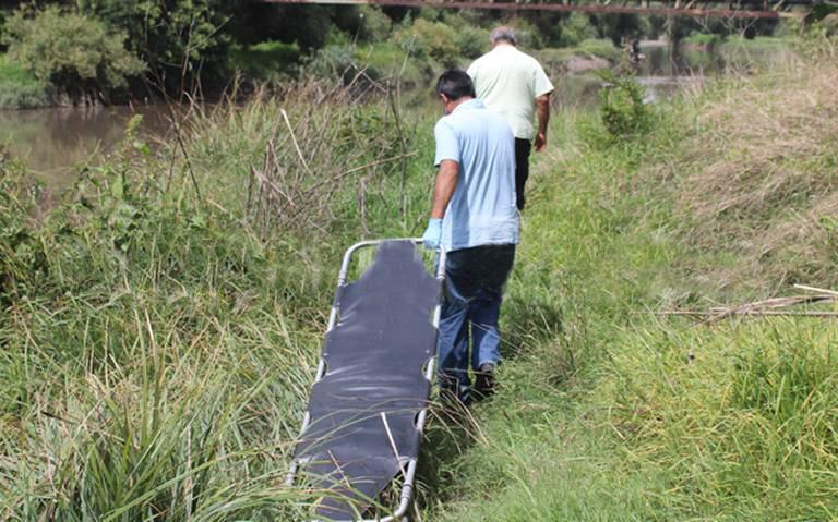 Hallan cuerpo sin cabeza ni extremidades en el Atoyac