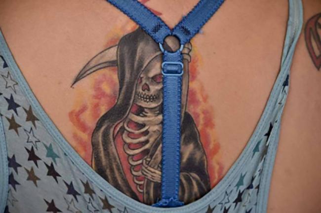 Tenía un tatuaje de la Santa Muerte mujer localizada en el relleno de Izúcar 