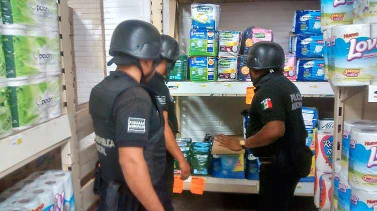 Realizan en Acatlán simulacro de explosivo en tienda del ISSSTE