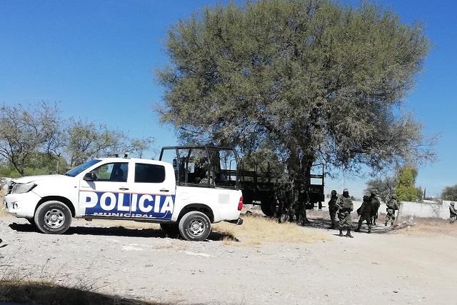 Lo matan en predio con camiones robados, en Tecamachalco