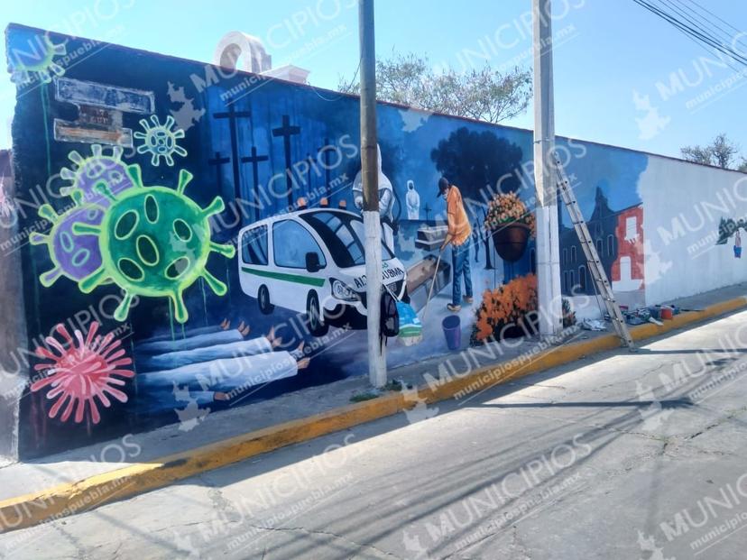 Inmortalizan al Covid-19 en mural de Atlixco